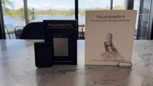 Plaud Note Pro and Plaud Note Pin S AI note takers side by side on wooden desk